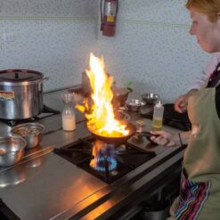 A Pan on Fire During a Cusco Cooking Class