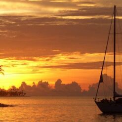 Beautiful sailing boat at sunset on San Blas Islands