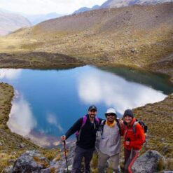 Group pose in front of lagoon