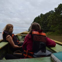 Two women in a boat on the river